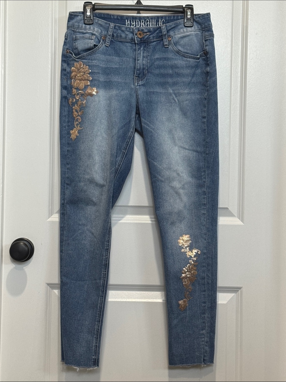 Hydraulic Blue Curvy Ankle Skinny Jeans with Gold Floral Accents